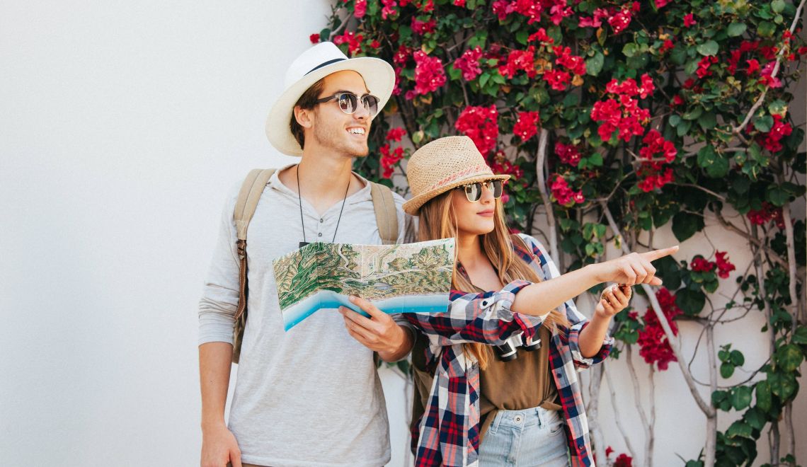 happy-travelers-with-map