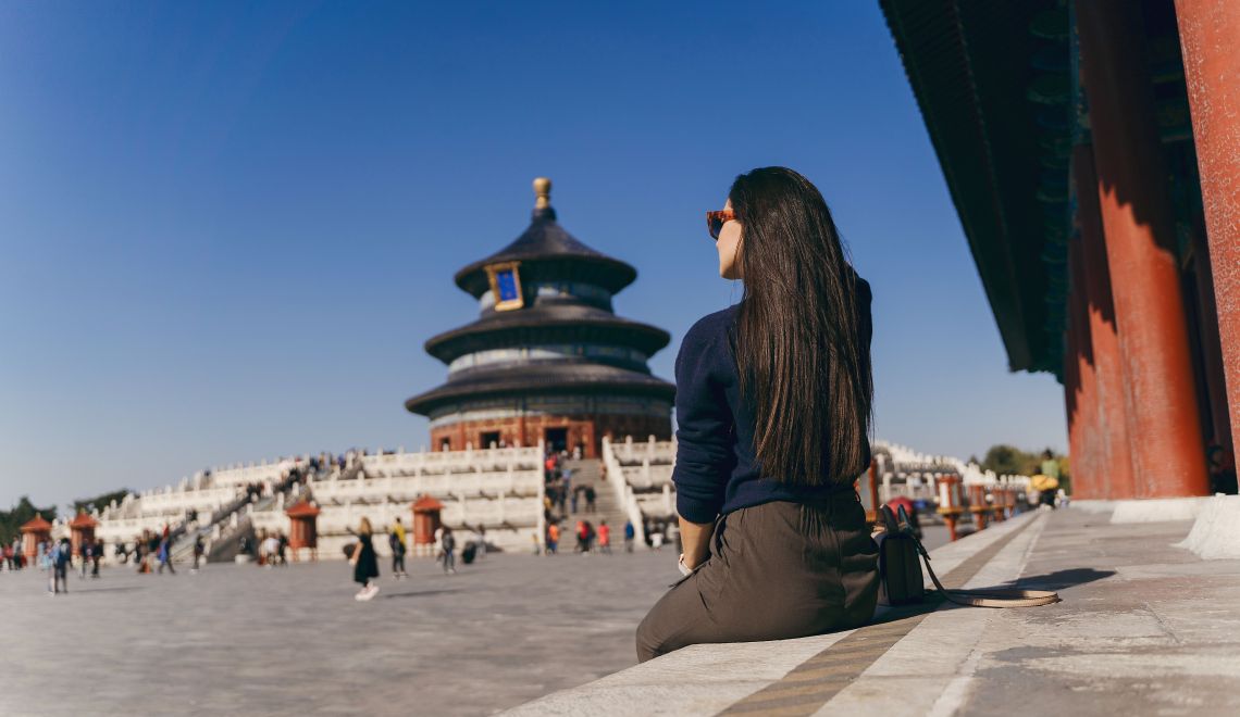brunette-girl-sitting-steps-by-temple-heven-china